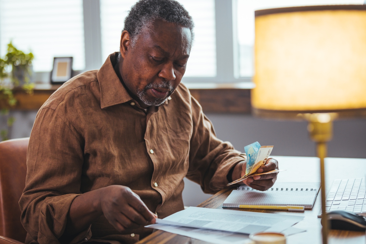 A senior looking over his benefits wondering will Medicare pay for a walk-in tub?