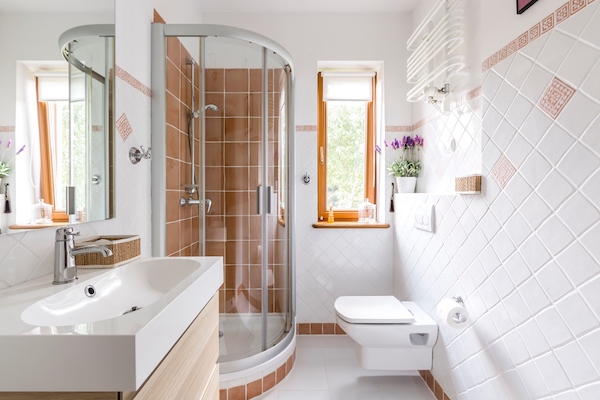 bathroom in Springfield, MO with white color and wood trim