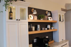 Creative Cabinetry with windows and lighted shelving. 